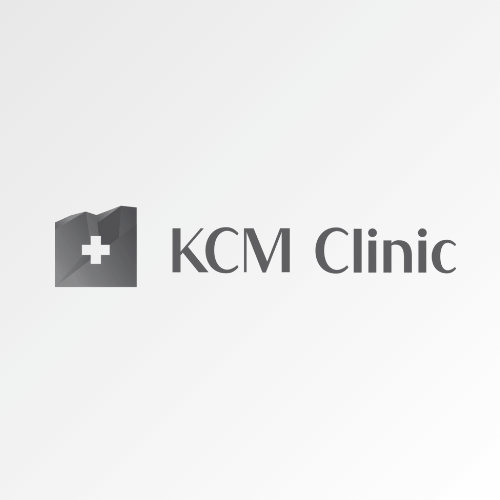 KCM Clinic logo with medical symbol