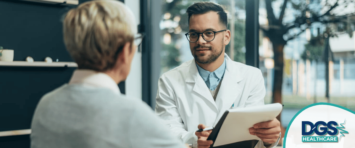 Doctor consulting with patient indoors.